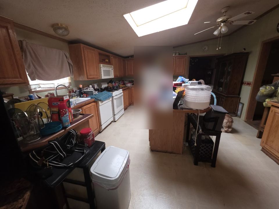 Before: Kitchen still full of stuff when I bought it. Cleaned out and fully redone.